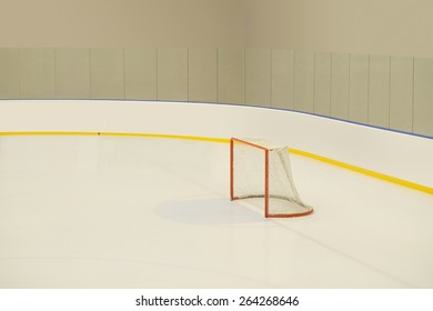 Empty Hockey Goal On Ice Rink.