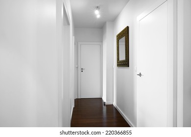 Empty Home Hall With Walls And Doors In White Colors. Can Be Used As A Background.