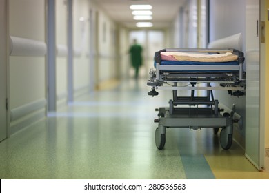 Empty Hospital Cot In A Corridor