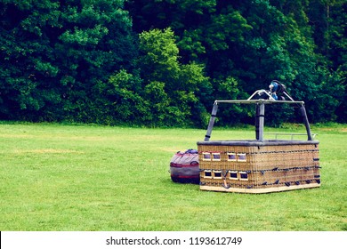 Empty Hot Air Balloon Basket On Ground
