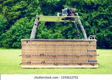 Empty Hot Air Balloon Basket On Ground
