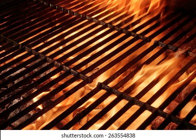 Empty Hot Barbecue Grill With Flames And Copy Space. Picnic Or Party Or Cookout Background. You Can See More Flaming Grill In My Set.