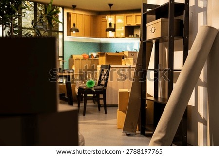 Empty house interior, packed items ready for storage, with cardboard boxes, new house organization, residential moving concept capturing relocation preparation and unpacking in new home.