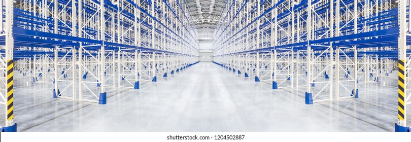 Empty Huge Distribution Warehouse With High Shelves