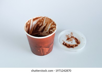 Empty ice cream chocolate in cup.