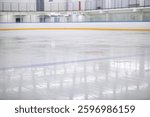 Empty ice rink, ice texture background for product display, indoor ice arena.