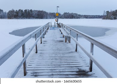 Empty Ice Swimming Place In Finland At Winter Day