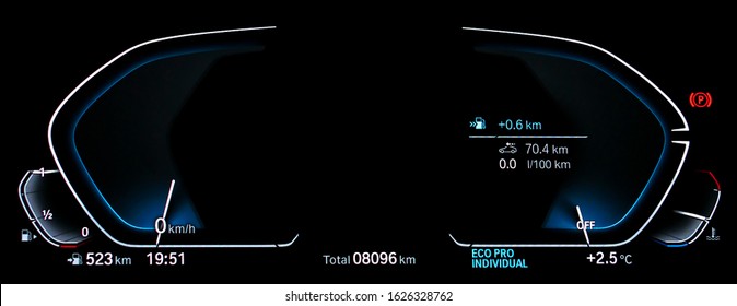 Empty illuminated car dashboard panel concept. Modern fully digital LCD instrument cluster without gauge needles and digits. Close up of two blank speedometer and tachometer circle dials at night. - Powered by Shutterstock