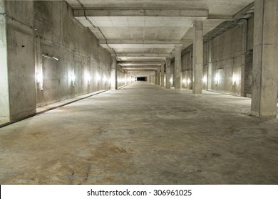 Empty industrial garage room interior with concrete floor and wall background