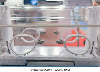 Empty Infant Incubator In An Hospital Room. Nursery Incubator In Hospital. Box For Carrying Premature Babies