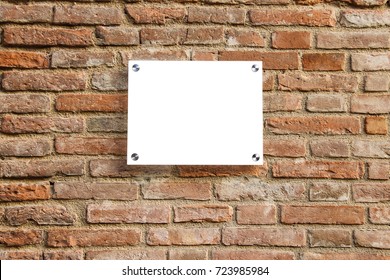 Empty Information Sign On Old Brick Wall. White Color