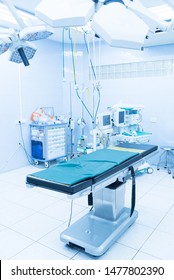 Empty interior operating room and modern equipment in hospital.Medical device for surgeon surgical emergency patient in blue tone style.Save life medical treatment concept.
