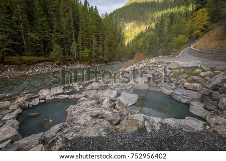 Empty and inviting natural hot springs next to Lussier River in Whiteswan Provincial Park, British Columbia, Canada