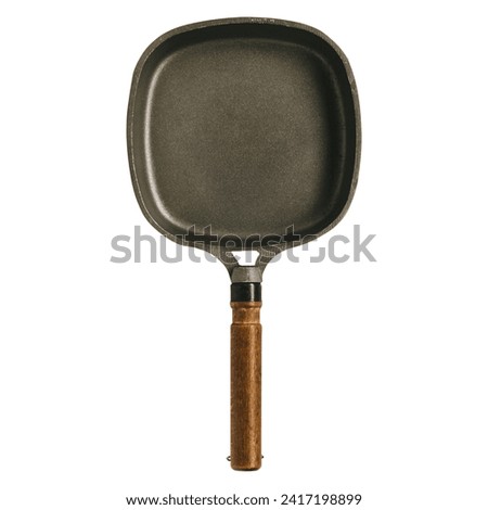 Empty iron cast skillet with wooden handle, Cast-iron frying pan isolated on perfect background. Frying pan isolated on white background.