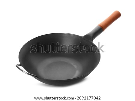 Empty iron wok isolated on white. Chinese cookware