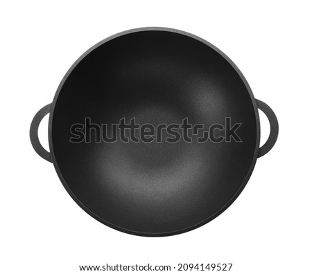 Empty iron wok isolated on white, top view. Chinese cookware