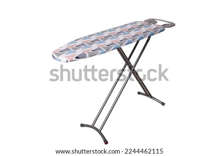 Empty ironing board isolated on white background. Ironing table side view. 