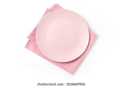 Empty Isolated Pink Plate With Pink Napkin On White Bakground. Food Background For Menu Or Recipe. Table Setting. Flatlay, Top View. Mockup For Restaurant Dish