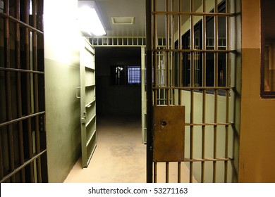 Empty jail cells in closed facility.  