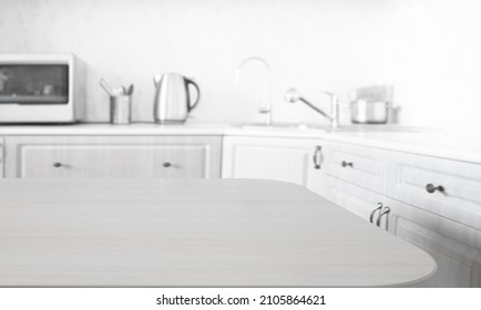 Empty Kitchen Island With Wooden Surface In Foreground, White Modern Countertop With Drawers And Microwave Oven, Lots Of Cups On Wall, Blurred Background