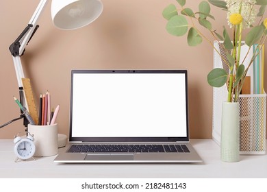 Empty Laptop Screen, Desktop Organizer With Desk Lamp And Office Supplies. Back To School, Home Office, Begining Of Studies Concept. Mockup, Template