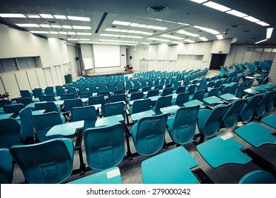 An Empty Large Lecture Room / University Classroom With Blue Chairs