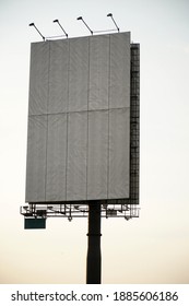 Empty Large Vertical Billboard At Sunset Time.                               