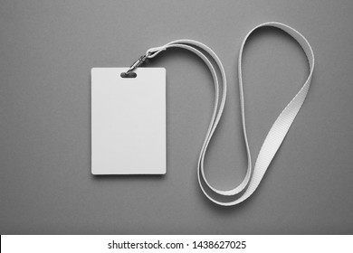 Empty layout layout. Common blank label name tag hanging on neck with thread. - Shutterstock ID 1438627025