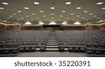 An empty lecture hall with a large amount of seats