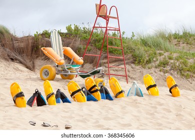 Empty lifesaver chair and equipment on the beach dunes
