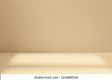 Empty light studio space with deep windows shadow. Sparse template and background