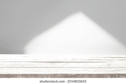 Empty light table close up on light wall texture background with shadows on background. Mockup for presentation, product branding, cosmetics, food or jewelry to showcase your product.