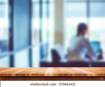 Empty Light Wood Table Top With Blur Office Background, Leave Space For Placement You Content,Template Mock Up For Montage Of Product