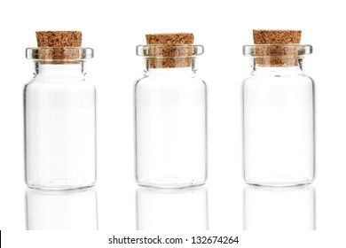 Empty little bottles with cork stopper isolated on white - Powered by Shutterstock