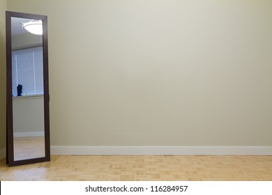 Empty Living Room With Mirror In A New Apartment