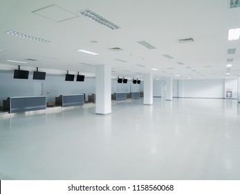 Empty Lobby Area With Counter Desks And Displays Can Be Used As Concept Financial Bank Or Boarding Check-in.