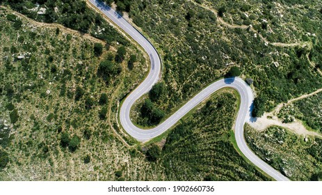 Empty Long Mountain Road To The Horizon On A Sunny Summer Day At Bright Sunset - Aerial Drone Shot.