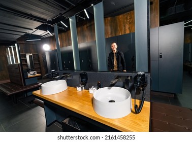 Empty Luxury Fitness Club Locker Room. Modern Dark Interior Of Locker Gym Room.