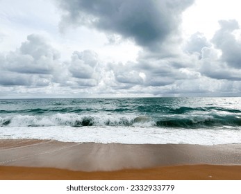 Empty Mai Khao beach in Thailand. Golden sand, deep blue water and moody monsoon clouds in the sky. Fantastic holiday destination. No people around. Wallpaper for inspiration and dreaming. - Shutterstock ID 2332933779