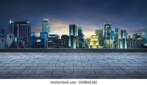empty marble floor and cityscape night scene