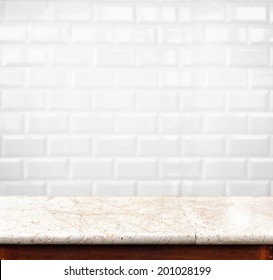 Empty Marble Table And Blur Ceramic Tile Brick Wall In Background. Product Display Template.