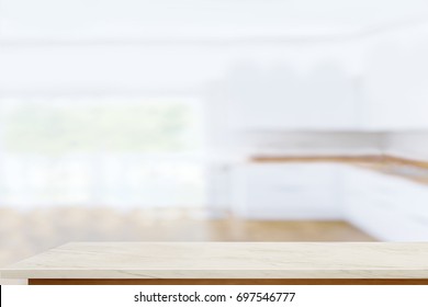 Empty marble table with blurred modern kitchen room background. for product display montage. - Shutterstock ID 697546777