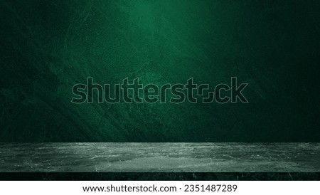empty marble table at foreground and cement stone at background with green light from above for product displayed in rustic mood. green backdrop. abstract background for product stand for advertising.