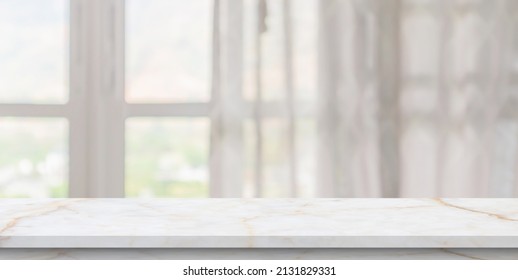 Empty Marble Table Top With Blur Window Curtain Background