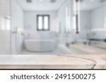 Empty marble top table with blurred bathroom interior Background. for product display.