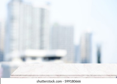 Empty Marble Top Table And Blurred City Scape Background. For Product Display Montage.