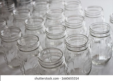 Empty Mason Jars Lined Up.