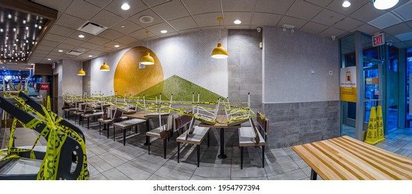 Empty McDonald's Restaurant, Indoor Dining Restrictions In New York City, Seating Space Covered By Yellow Tape, In The Bronx, New York, United States 4.12.2021