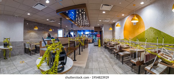 Empty McDonald's Restaurant, Indoor Dining Restrictions In New York City, Seating Space Covered By Yellow Tape, In The Bronx, New York, United States 4.12.2021