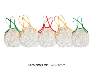 Empty Mesh Shopping Bag, White Net Cotton String With Green ,red,yellow Holding Border On White Background And Clipping Path. Tote Bag Contain Vegetable Or Fruit, Reuseable And Washable,Eco Market Bag